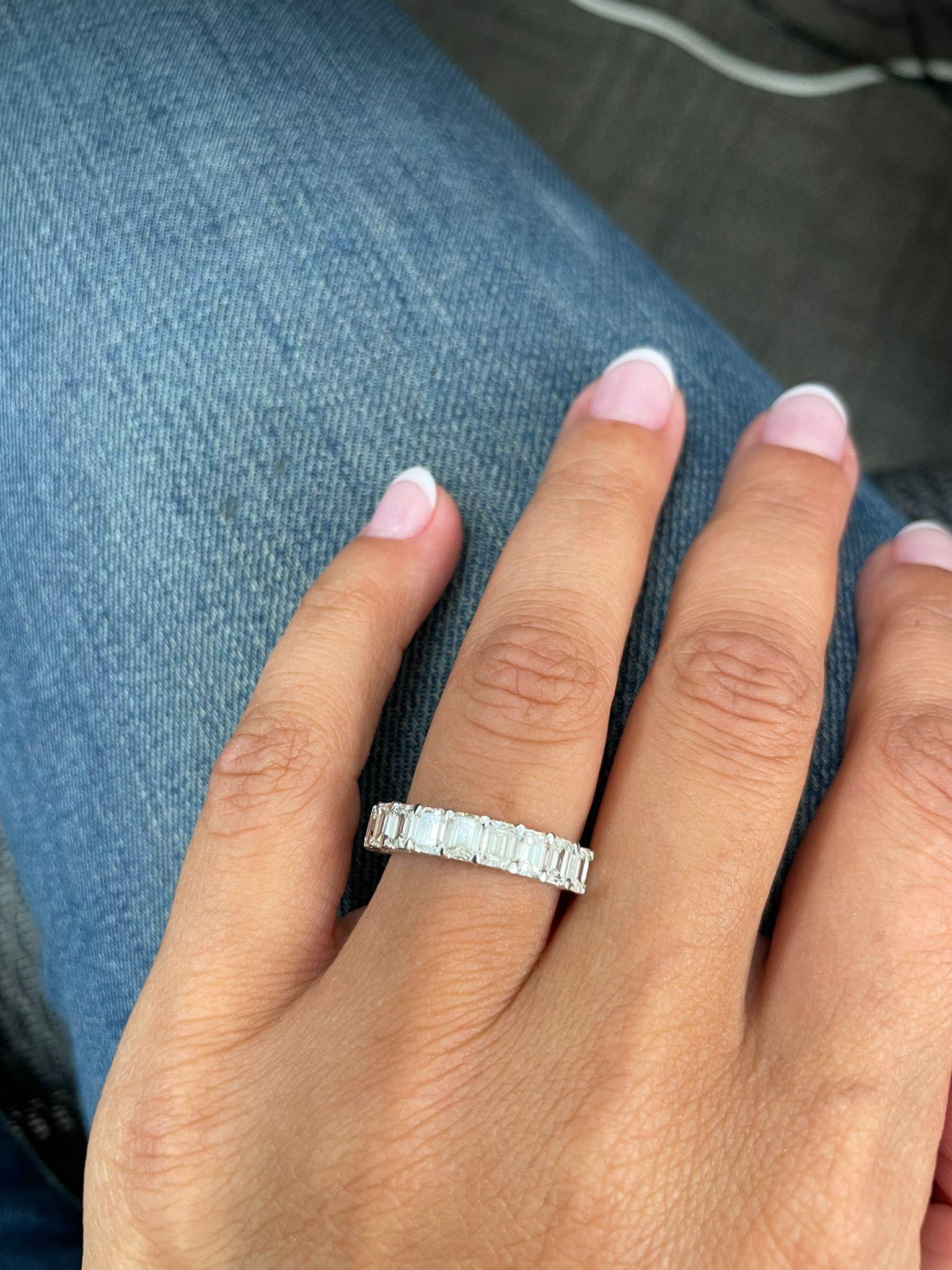 This Elegant and Charming half way around Band crafted of 14K Gold features 10 Emerald Cut Diamonds weighing 2.21cts, Diamond Color & Clarity is GH-SI1. This Ring can be sized one size up or down by your Jeweler. Size 7
 
 14K Gold
 10 Emerald Cut