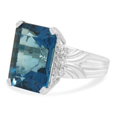 14K White Gold Emerald Cut Blue Topaz and Round Diamond Accent Ring
