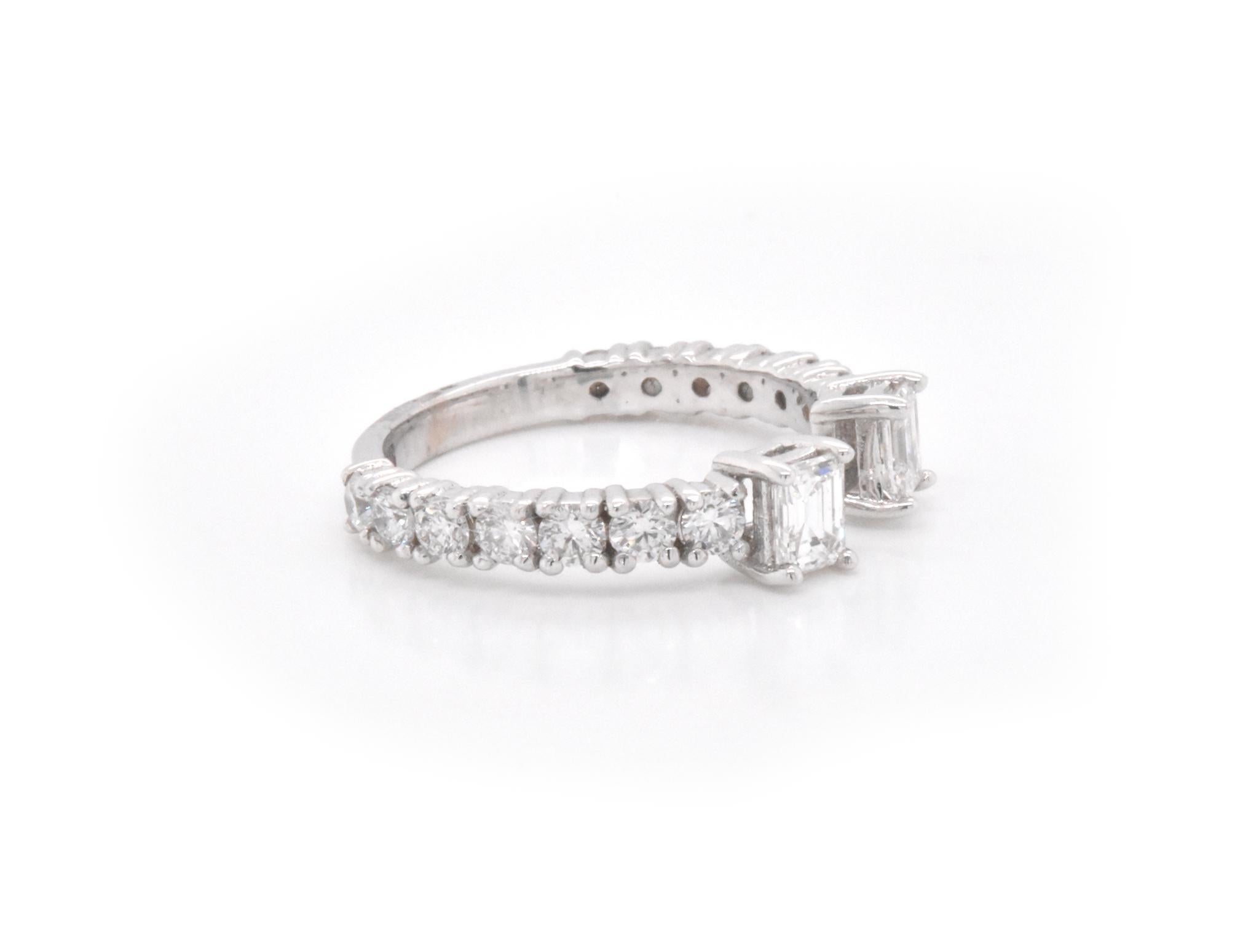 Designer: The Estate Watch and Jewelry Company
Material: 14k white gold
Diamonds: 2 emerald cut diamonds = 0.62cttw
Color: G
Clarity: VS1
Mounting Diamonds: 14 round brilliant cuts = 0.86cttw
Ring size: 7 (please allow two additional shipping days