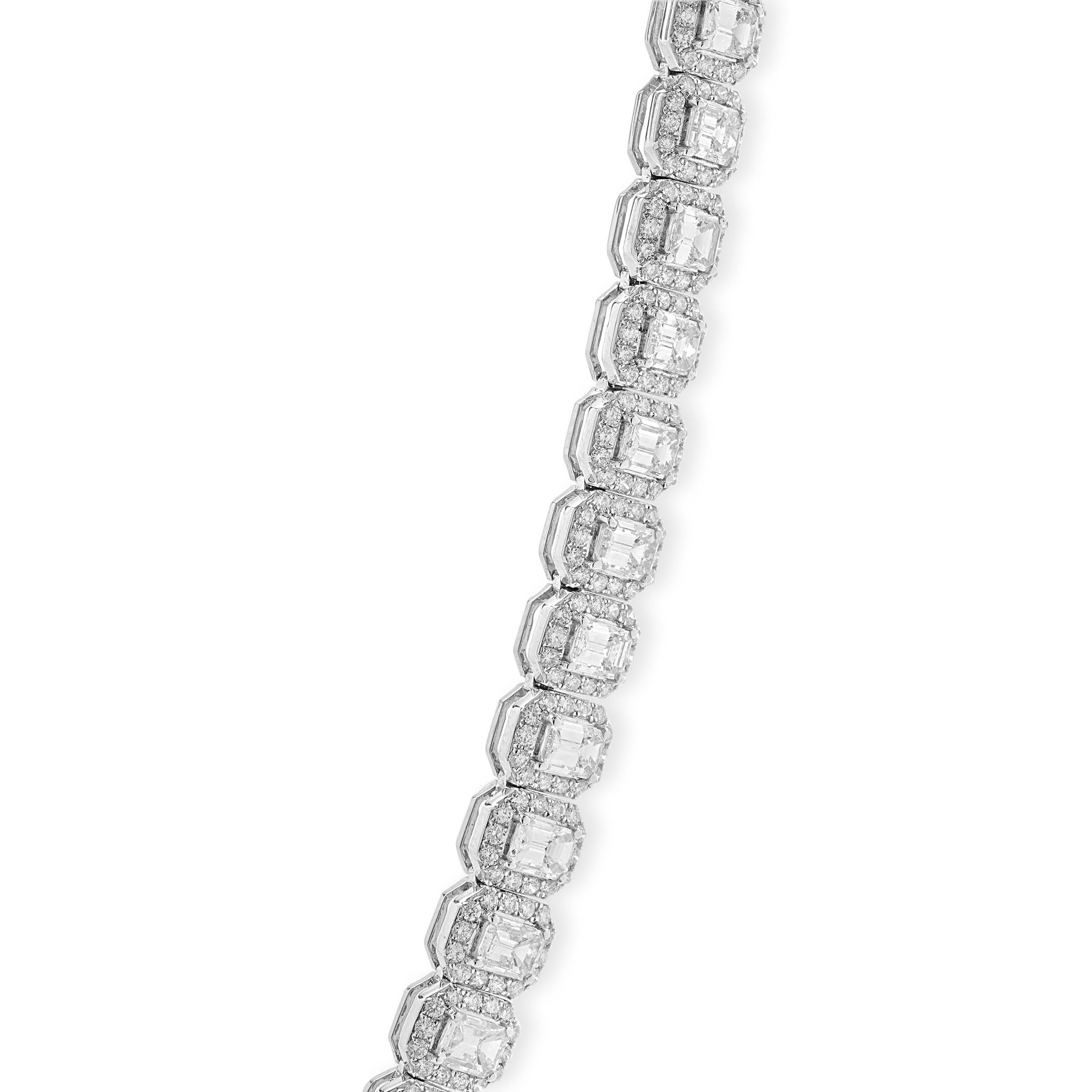 Designer: custom
Material: 14K white gold
Diamonds: 76 Emerald Cut Diamond = 20.03cttw
Diamonds: 1036 round brilliant= 6.06cttw
Color: G
Clarity:VS- SI1
Dimensions: necklace measures 16.5-inches in length 
Weight: 34.46 grams
