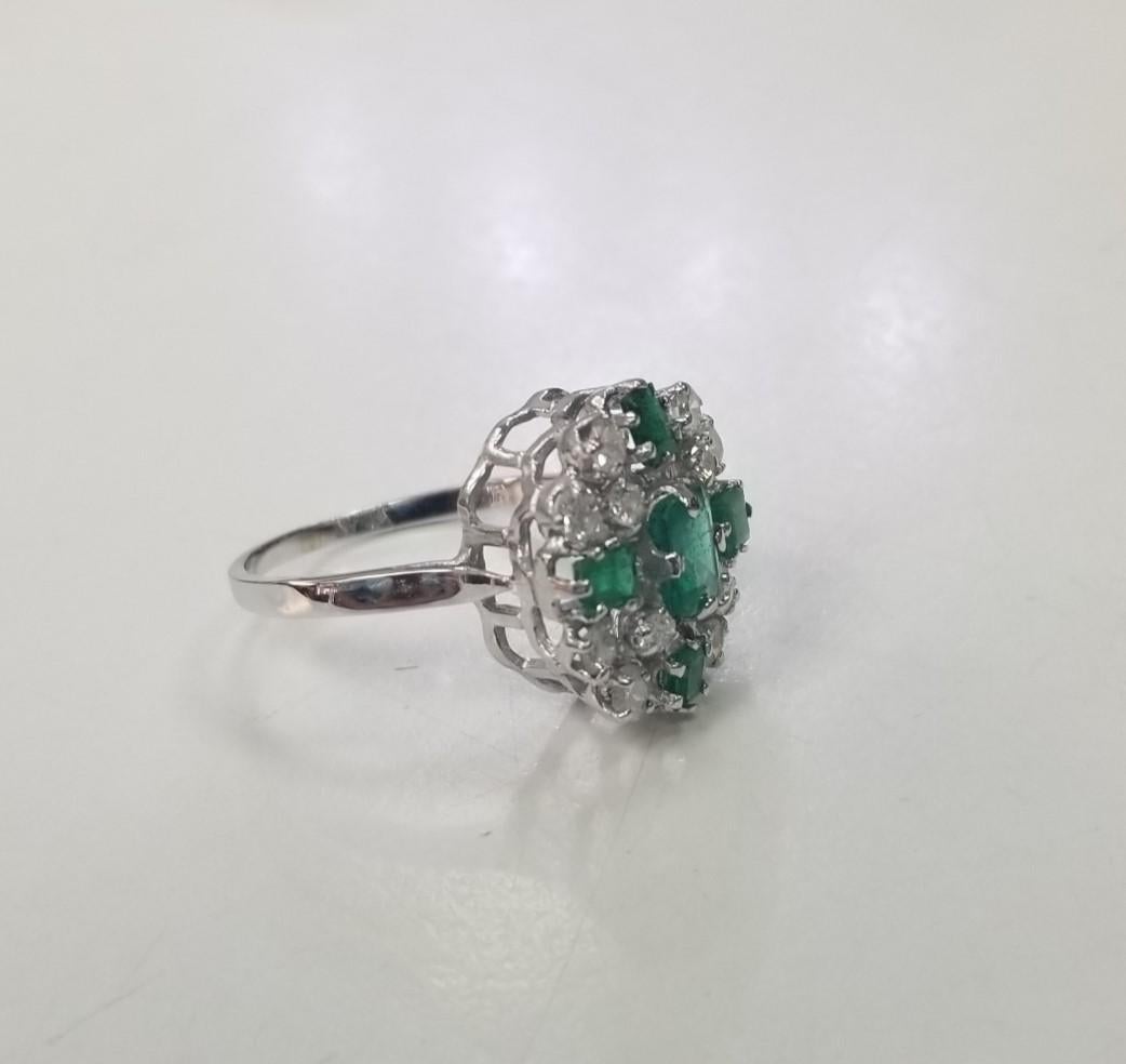 *Motivated to Sell – Please make a Fair Offer*
Specifications: 
    Metal: 14k white gold
    Weight: 3.7 Gr
    Main Stone: Emerald Cut Emerald .92cts.
    Side Stones: 12 Diamonds    
    Weight: .62cts.
    Color: G
    Clarity: SI1-3
    Size:
