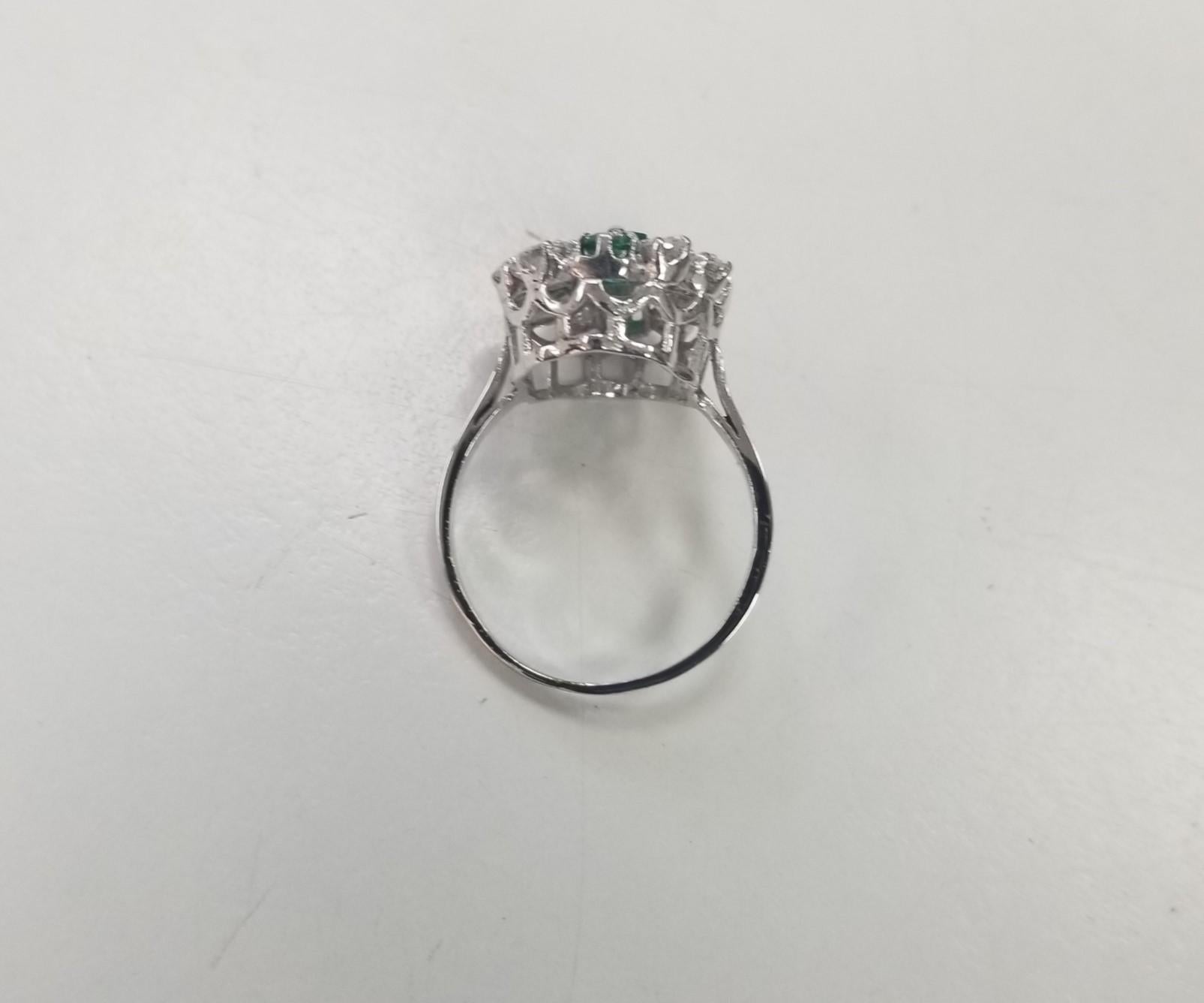 14k White Gold Emerald Cut Emerald and Diamond Cluster Ring In Excellent Condition For Sale In Los Angeles, CA