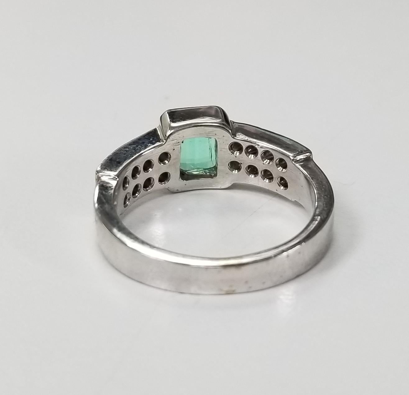 Contemporary 14 Karat White Gold Emerald Cut Emerald and Diamond Ring For Sale