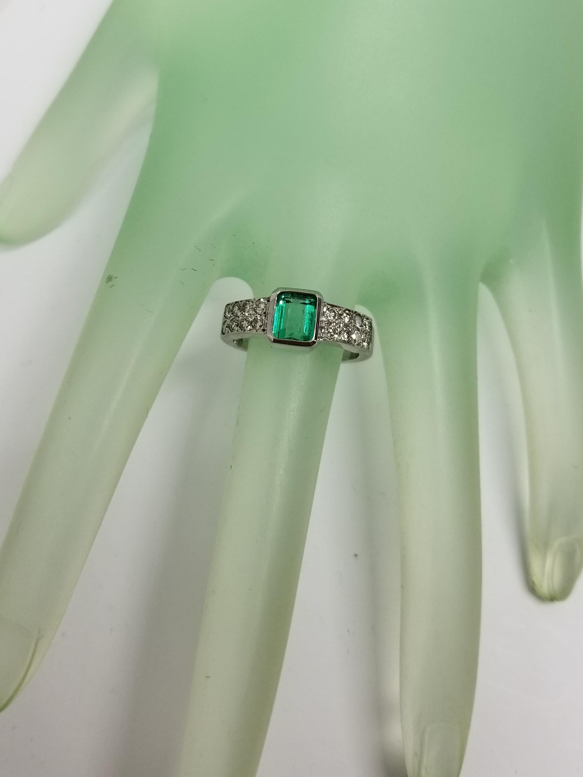 14 Karat White Gold Emerald Cut Emerald and Diamond Ring For Sale 1