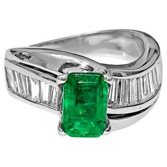 Oro bianco 14K. Anello di fidanzamento con smeraldo e diamante