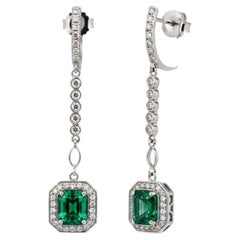 14K White Gold Emerald Halo Diamond Lariat Earrings, 2.40ct Emeralds