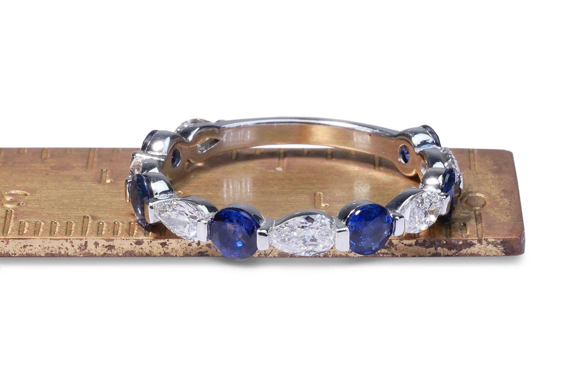 A gorgeous half eternity Ring with a dazzling 1.1-carat Round Mix Cut of Natural Sapphire. It has 0.6 carats of side diamonds which add more to its elegance. The jewelry is made of 14K White Gold with a high-quality polish. It comes with an IGI