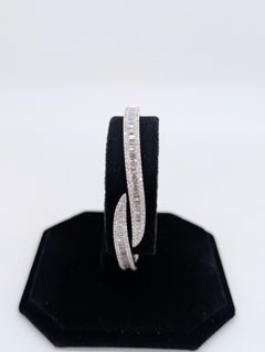 14K White Gold Fancy Shape Bangle with Baguette Cut and Brilliant Round Diamonds