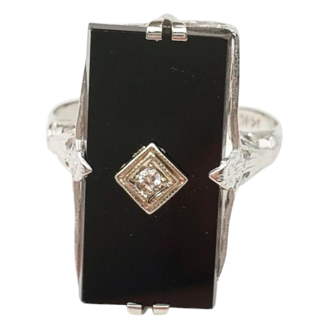 Anillo de oro blanco de 14 quilates con filigrana de ónix y diamantes #16587