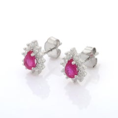 14K White Gold Fine Pear Cut 1.02 ct Ruby Stud Earrings with Halo of Diamonds
