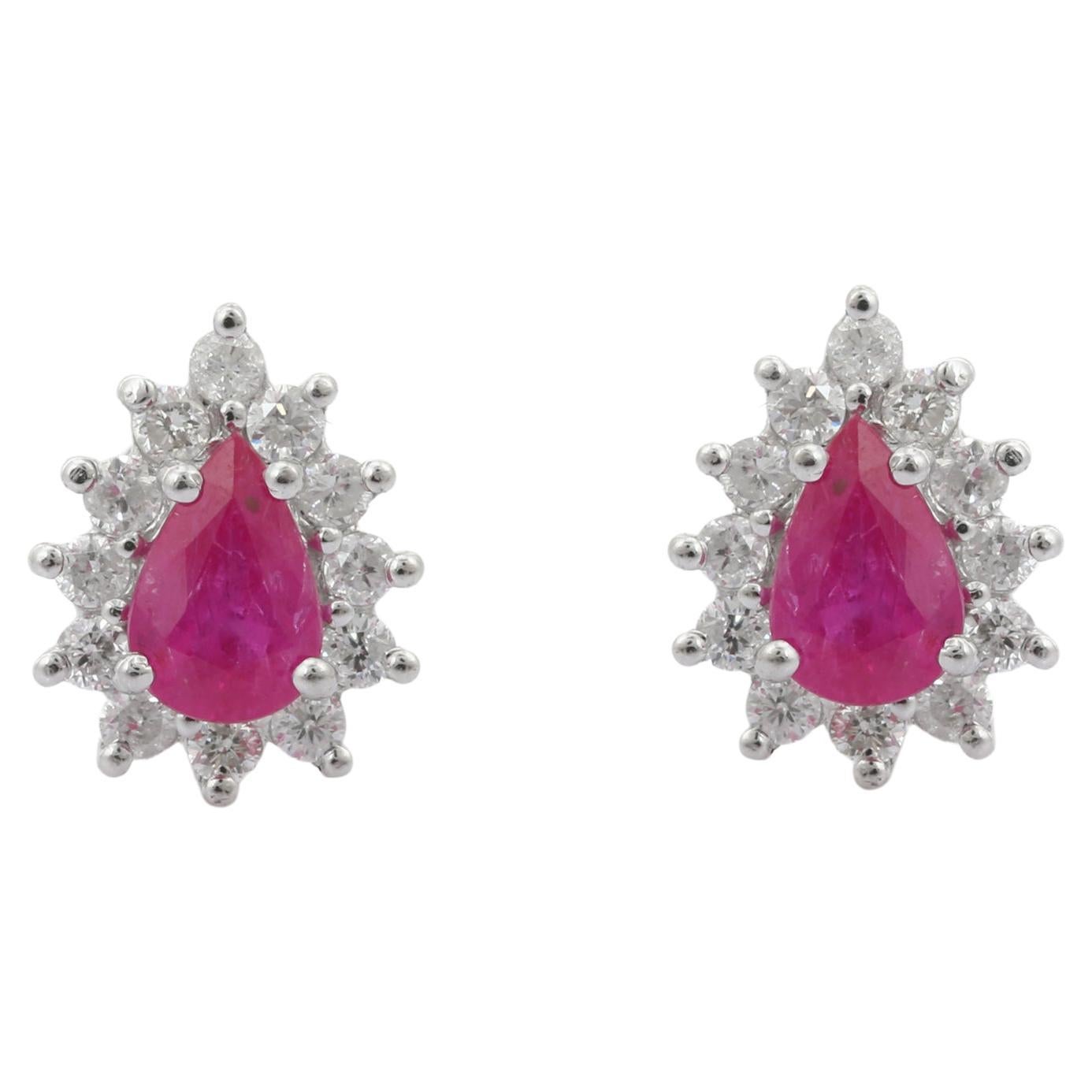 14K White Gold Fine Pear Cut 1.02 ct Ruby Stud Earrings with Halo of Diamonds For Sale