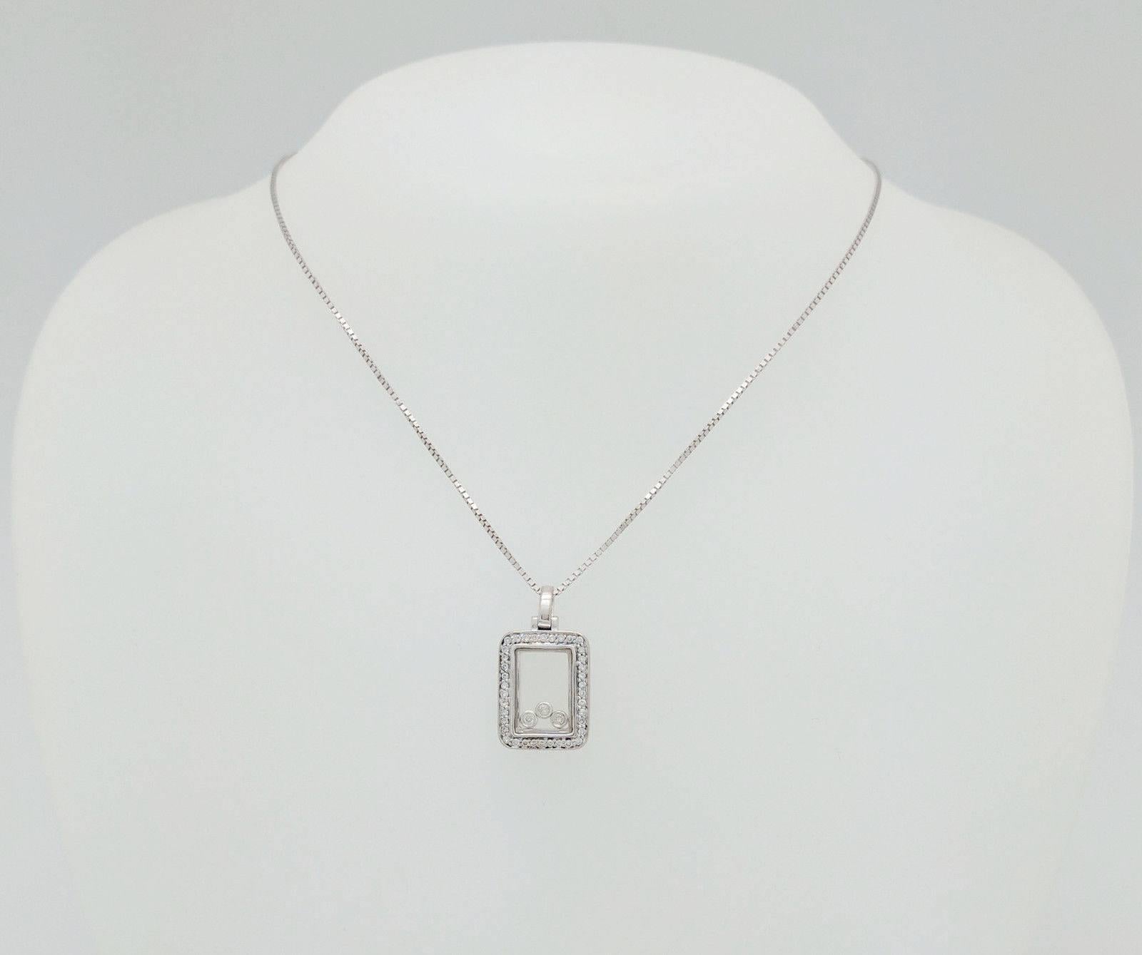 14K White Gold Floating Diamond Rectangle Pendant Necklace

You are viewing a beautiful floating diamond rectangle pendant necklace. This piece is crafted from 14k white gold and weighs 8.7 grams. The pendant features (40) round natural diamonds for