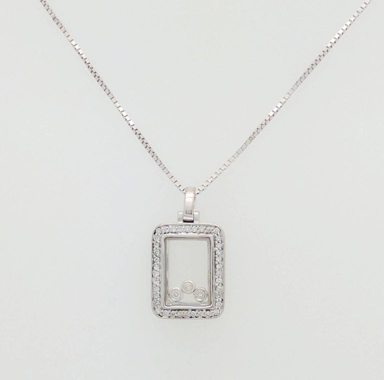 14 Karat White Gold Floating Diamond Rectangle Pendant Necklace For