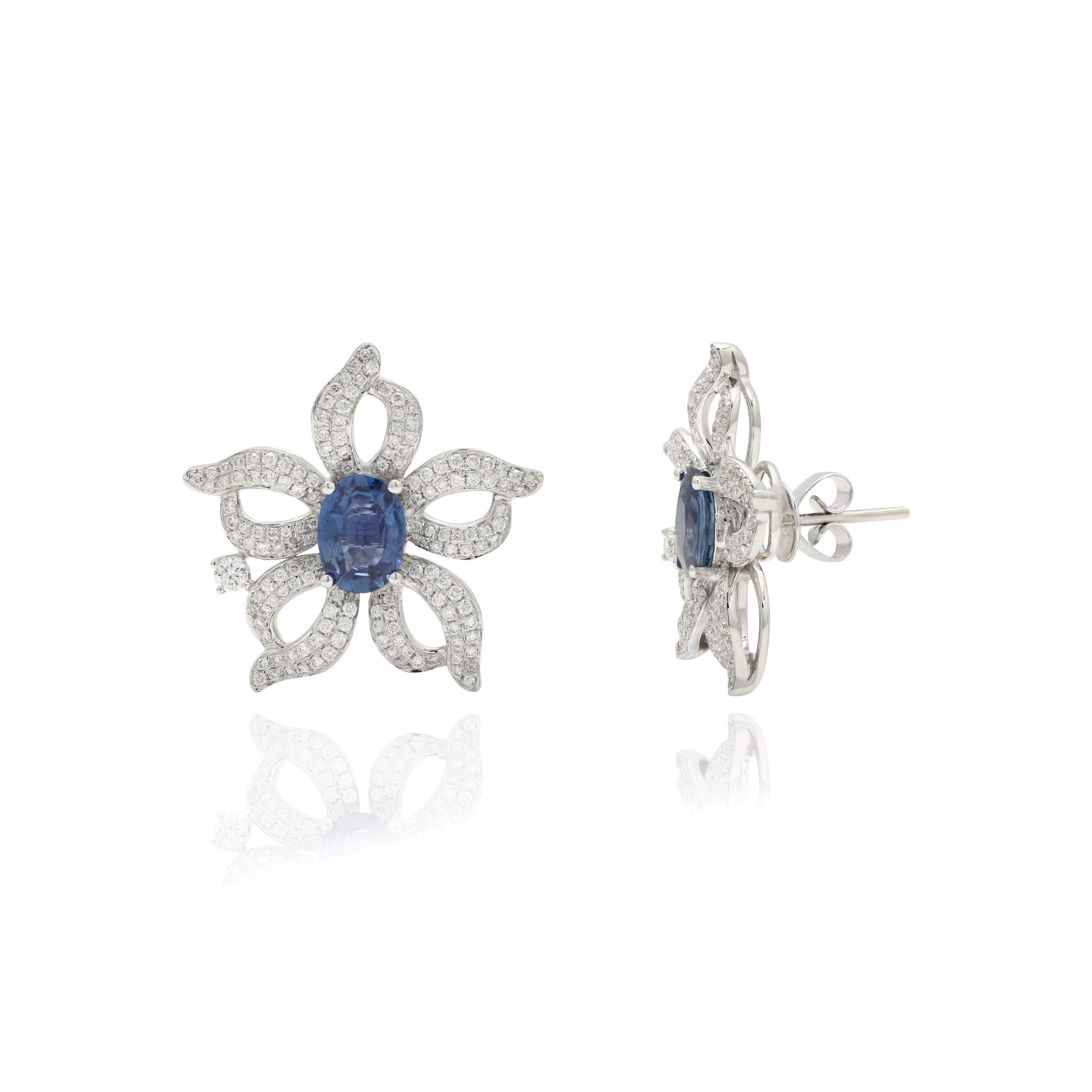 Artist 14K White Gold Flower Stud Earrings Studded with Diamond and Sapphire For Sale