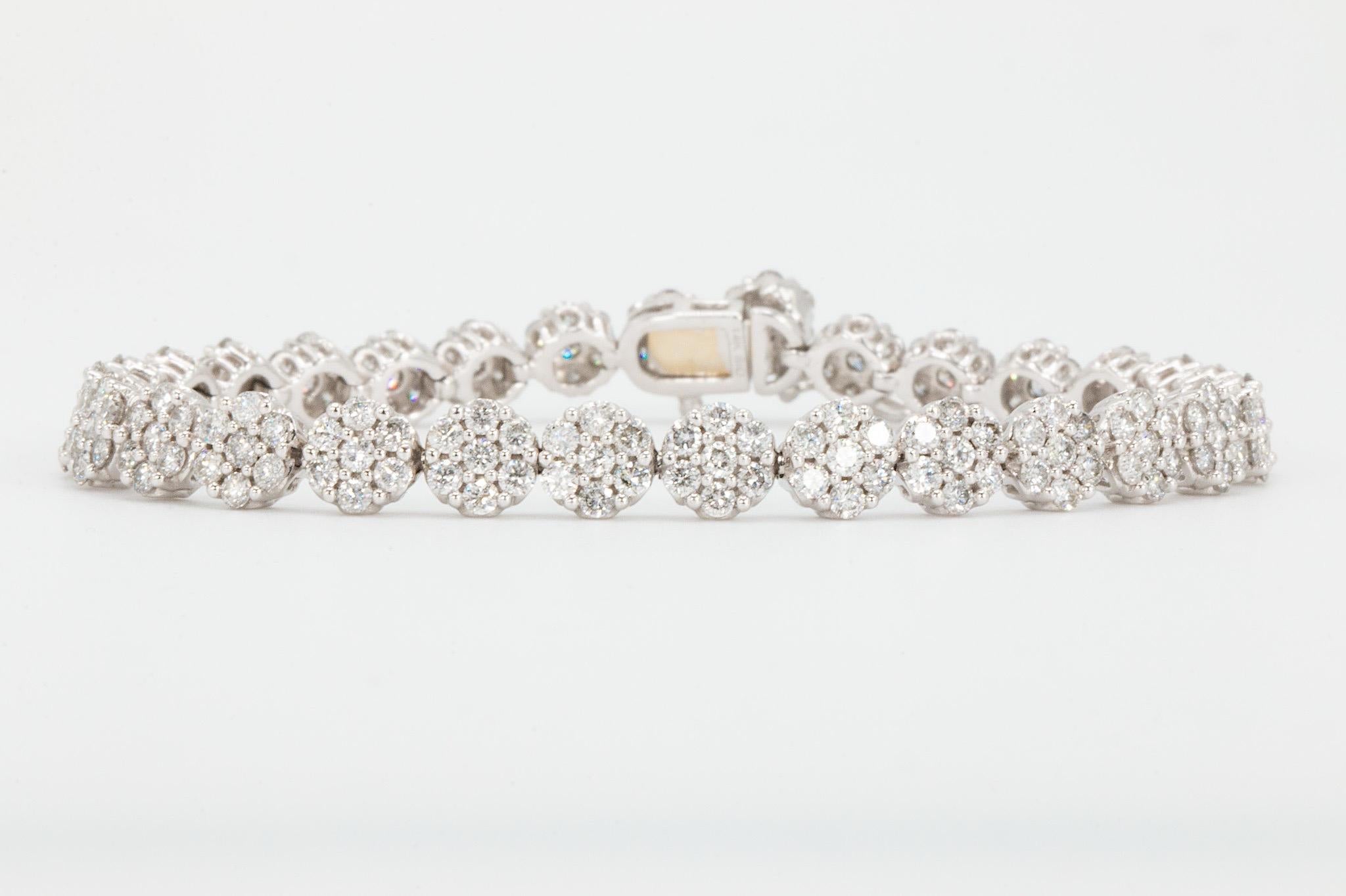 14k White Gold Floral Design Diamond Tennis Bracelet

Elevate your collection with this timeless 14K white gold diamond bracelet, showcasing 217 round brilliant-cut natural diamonds with a total carat weight of approximately 4.5 carats. Graded G–H
