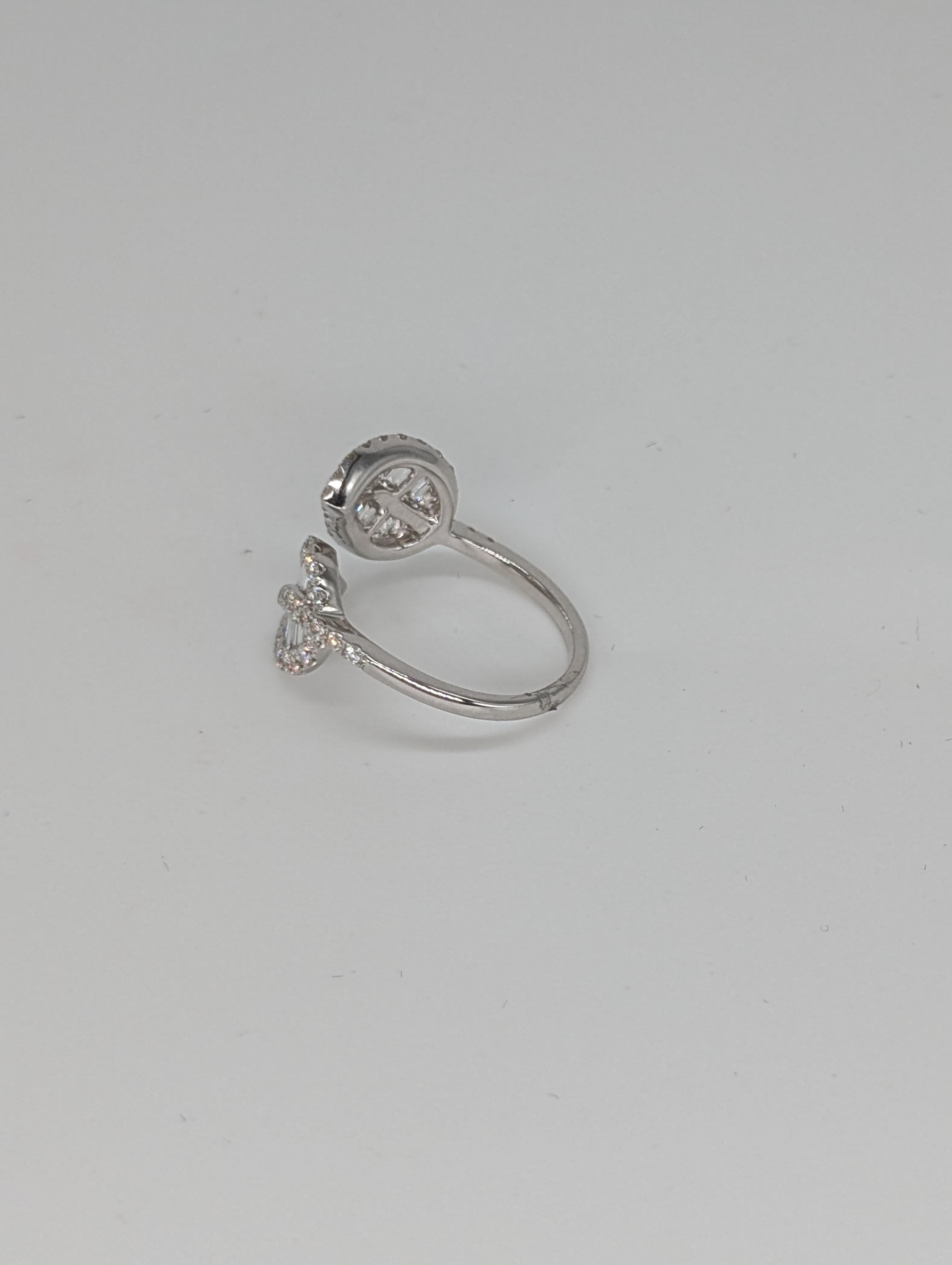 Women's 14k White Gold Floral Leaf Bypass Ring with Baguette and Round Diamonds For Sale