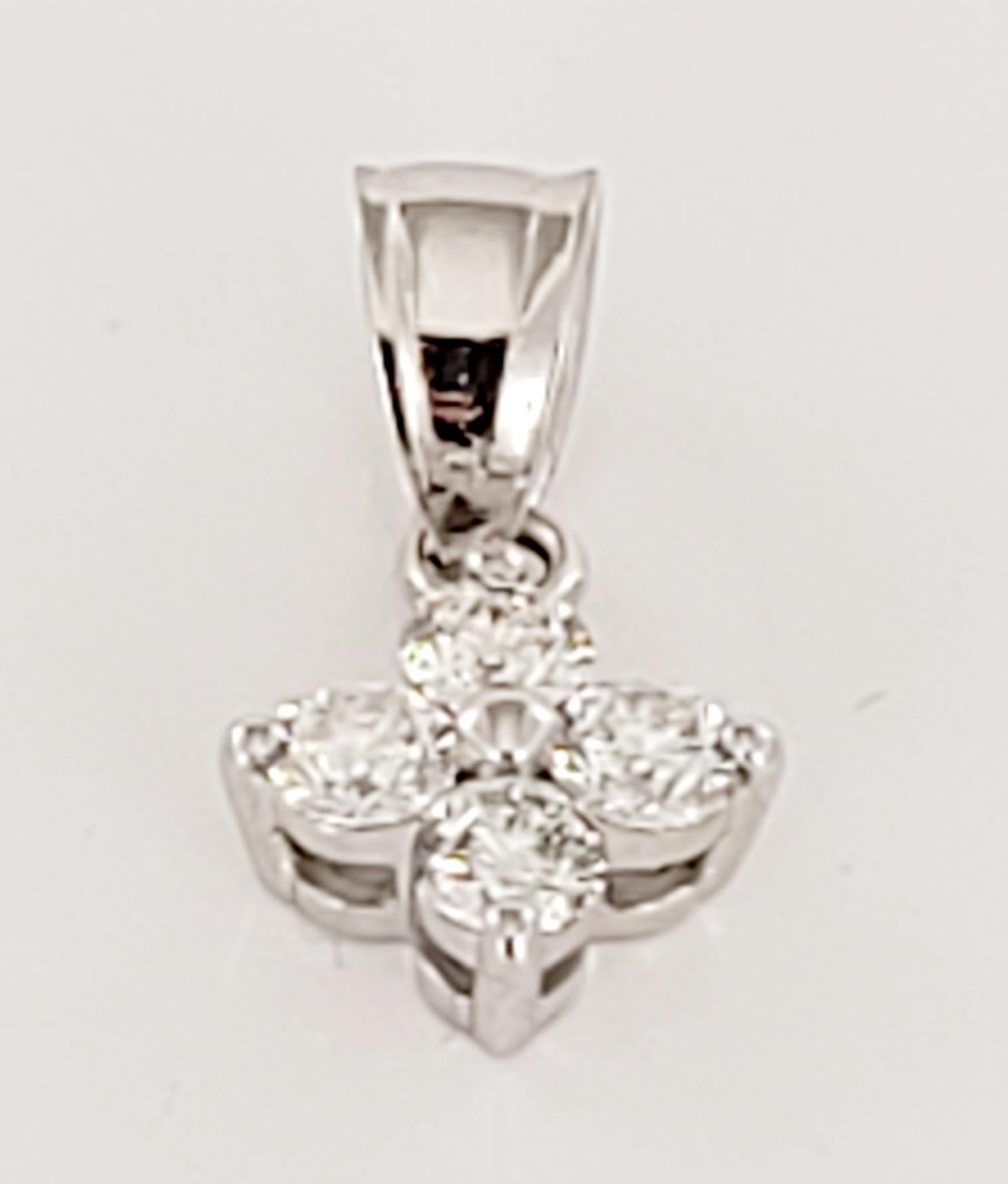 Flower Shape Pendant
14K White Gold
Diamonds .45ct
Diamond Clarity VS 
Color Grade G
Condition New, without tags  
Retail Price:$700