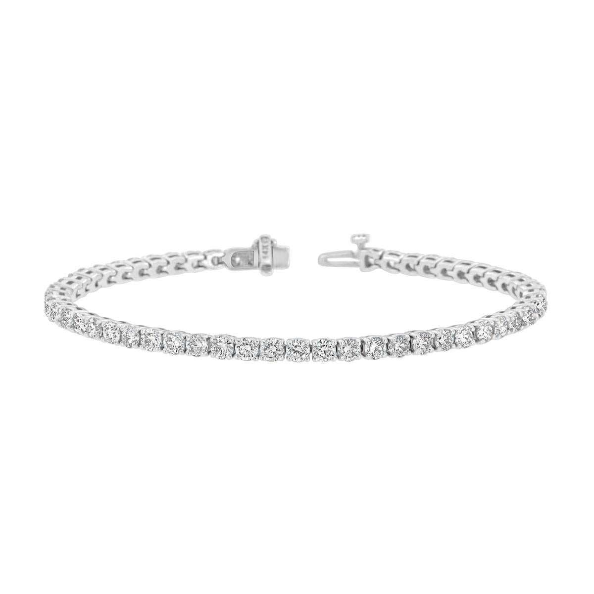 A timeless four prongs diamonds tennis bracelet. Experience the Difference!

Product details: 

Center Gemstone Type: NATURAL DIAMOND
Center Gemstone Color: WHITE
Center Gemstone Shape: ROUND
Center Diamond Carat Weight: 5.76
Center Diamond Color: