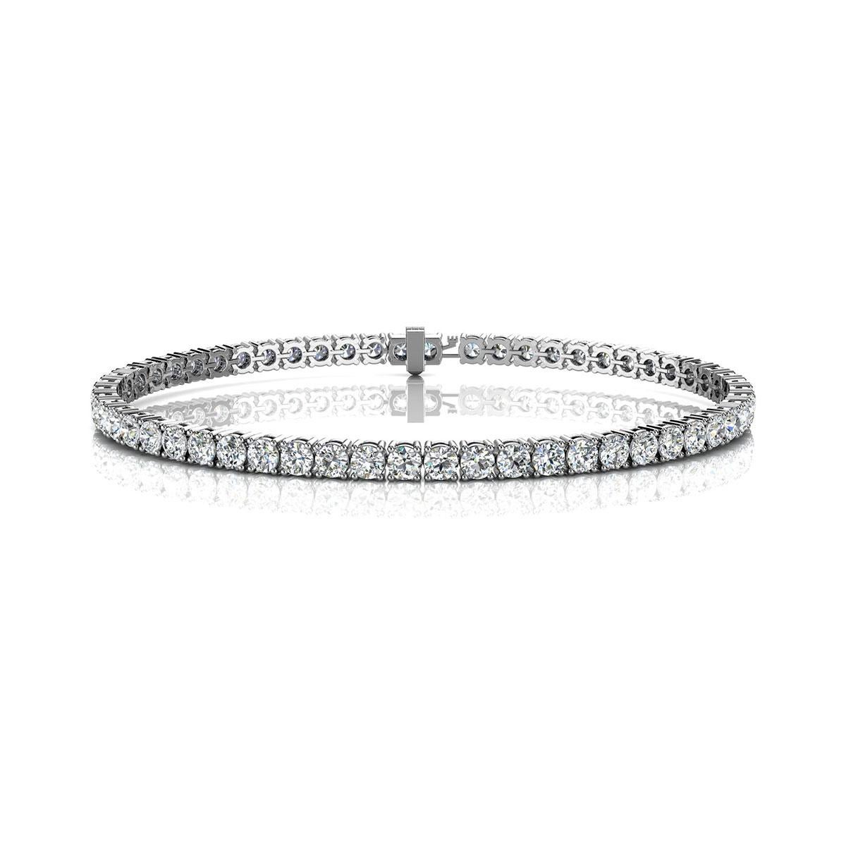 A timeless four prongs diamonds tennis bracelet. Experience the Difference!

Product details: 

Center Gemstone Type: NATURAL DIAMOND
Center Gemstone Color: WHITE
Center Gemstone Shape: ROUND
Center Diamond Carat Weight: 5
Metal: 14K White