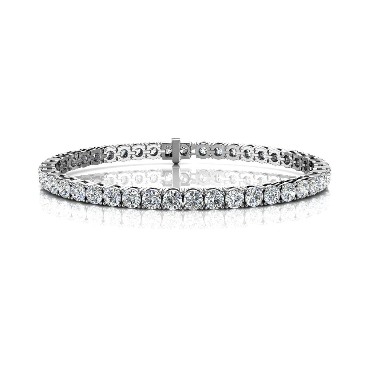 A timeless four prongs diamonds tennis bracelet. Experience the Difference!

Product details: 

Center Gemstone Type: NATURAL DIAMOND
Center Gemstone Color: WHITE
Center Gemstone Shape: ROUND
Center Diamond Carat Weight: 8
Metal: 14K White