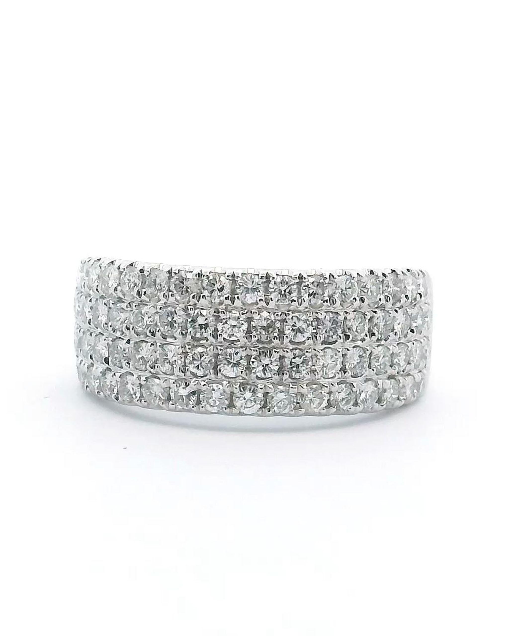 14K white gold ring with four rows of diamonds weighing 1.05 carats total.

- Finger size 6.5
- Diamonds are H color, SI clarity.