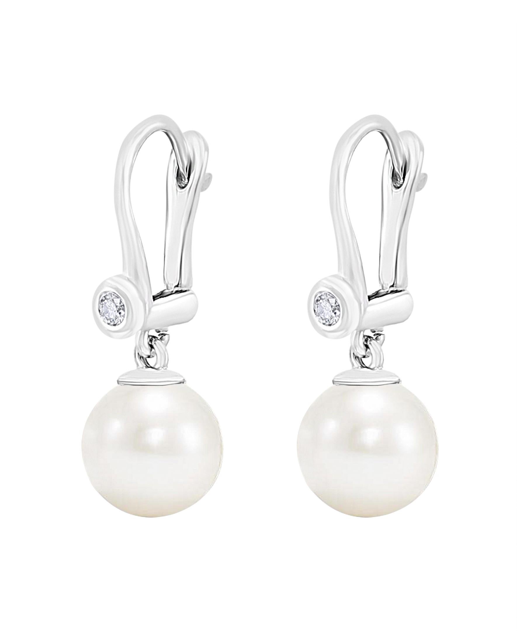 These Chinese freshwater cultured pearls are 8-8.5mm and set on a 14K white gold lever-back earring with 0.06 carats of diamonds set in a round bezel. The classic yet versatile design of these earrings is perfect for the working woman or for an