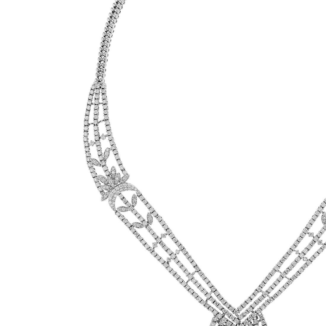 This necklace is made in 14K white gold and features 756 round cut diamonds weighing 16.09 carats combined. Necklace has a color grade (H). and clarity grade (SI2). All stones are prong set

