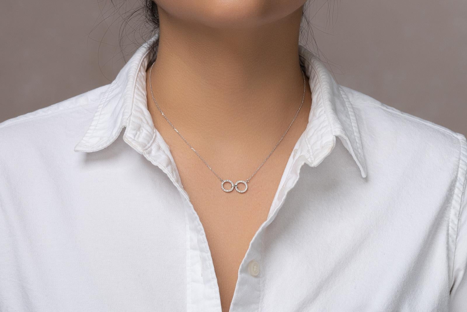This geo art necklace is subtle but striking. A beautiful diamond necklace that catches attention without overpowering. The essence of elegant every day fine jewelry. The diamond necklace in 14k white gold is perfect to gift someone you share a