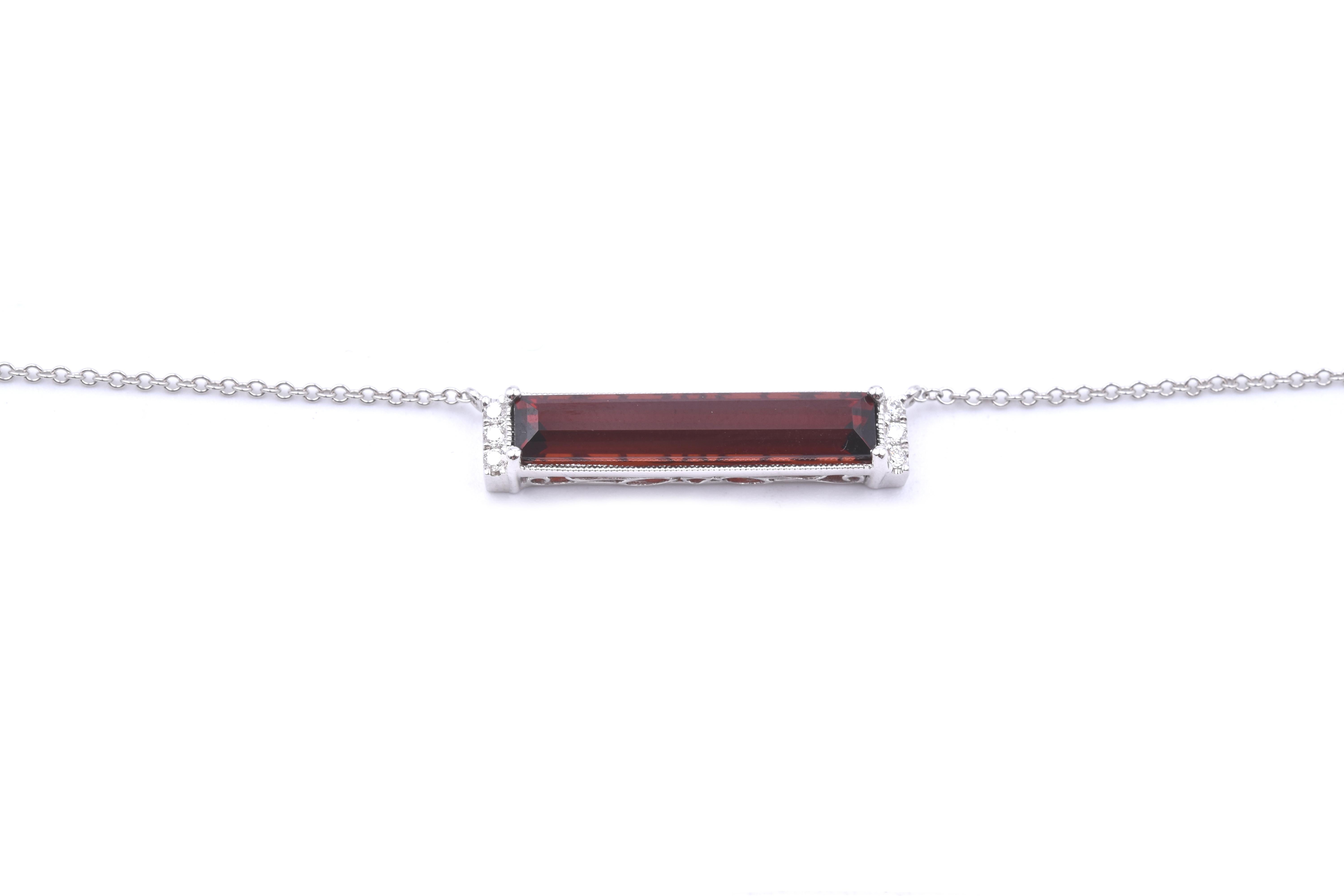 Designer: The Estate Watch and Jewelry
Material: 14k white gold
Garnet: 1 emerald cut garnet = 3.75ct
Diamonds: 6 round brilliant cuts = 0.09cttw
Dimensions: necklace is 17-inches in length
Weight: 3.42 grams
