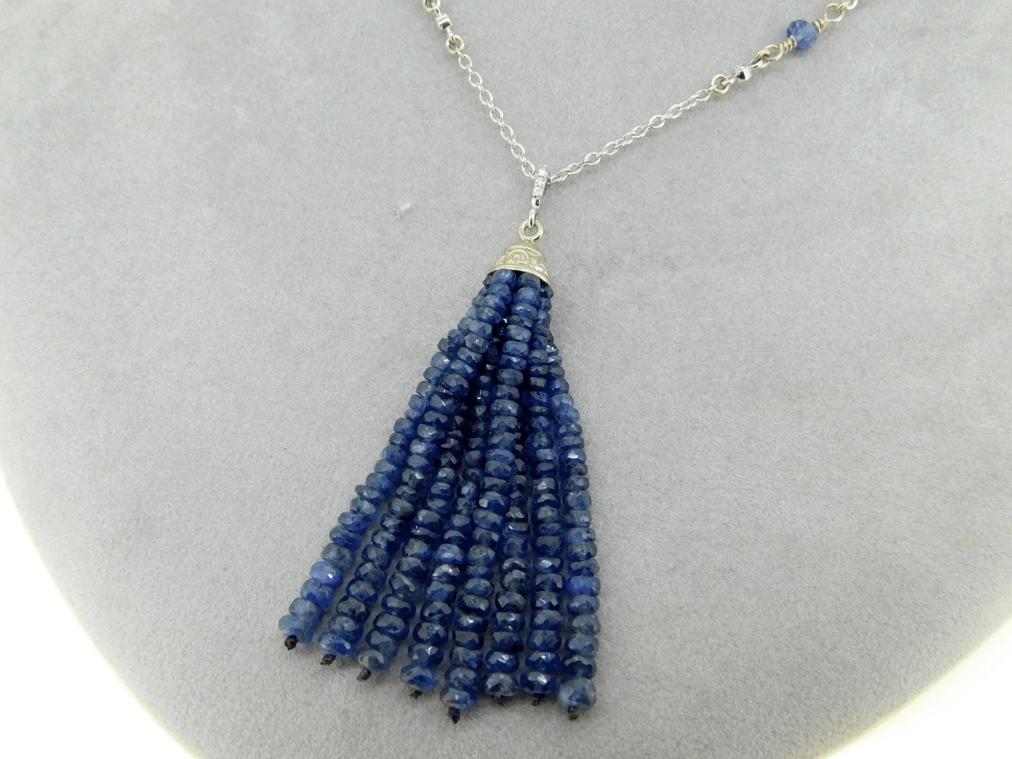 14k White Gold Genuine Natural Diamond and Blue Sapphire Tassel Pendant (#J4682)

14k white gold blue sapphire tassel pendant with twenty-two carats of royal blue faceted sapphire beads. The pendant measures 2 1/2