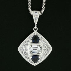 14 Karat Gold GIA Emerald Cut Diamond and Trillion Sapphire Pendant Necklace