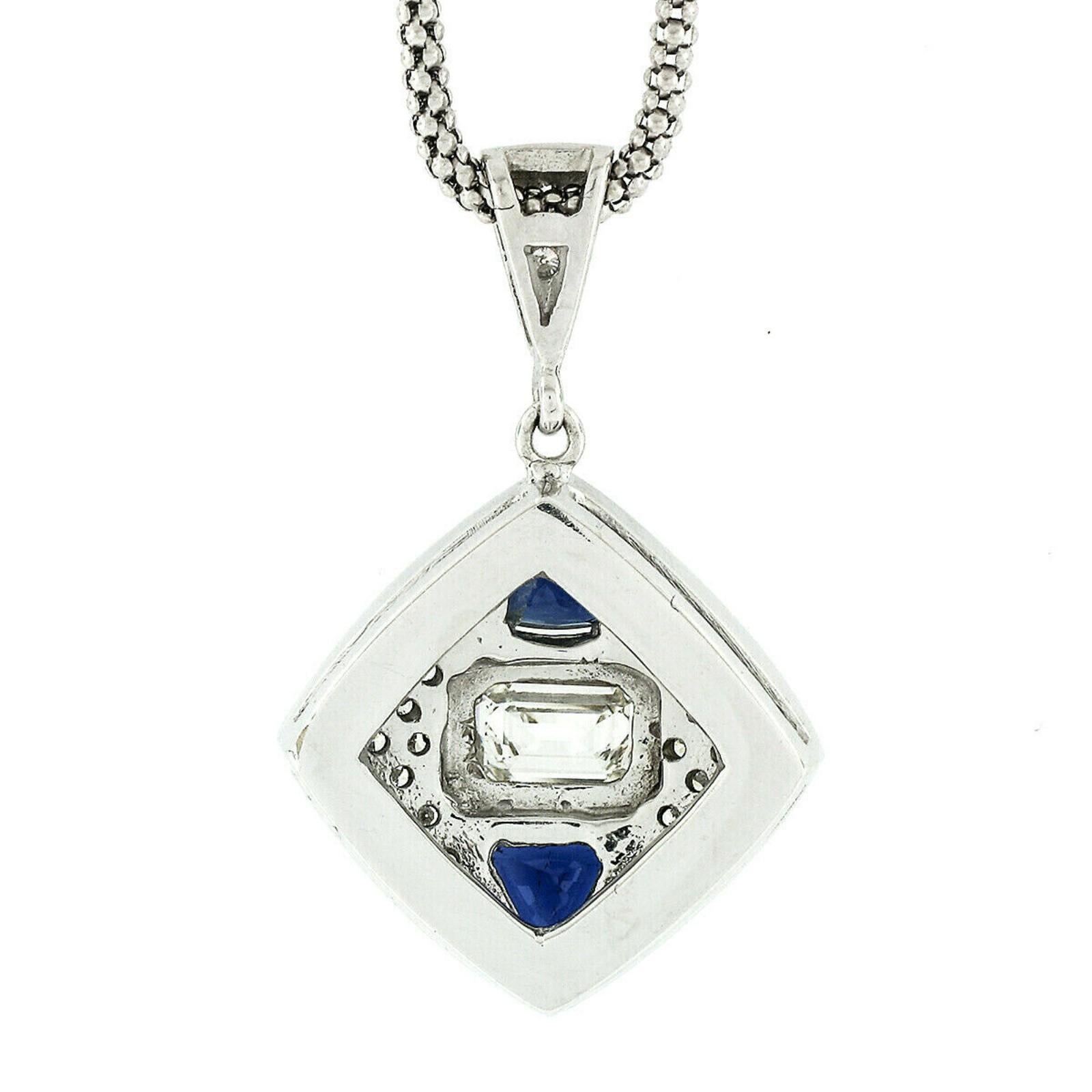 Women's 14 Karat Gold GIA Emerald Cut Diamond and Trillion Sapphire Pendant Necklace For Sale