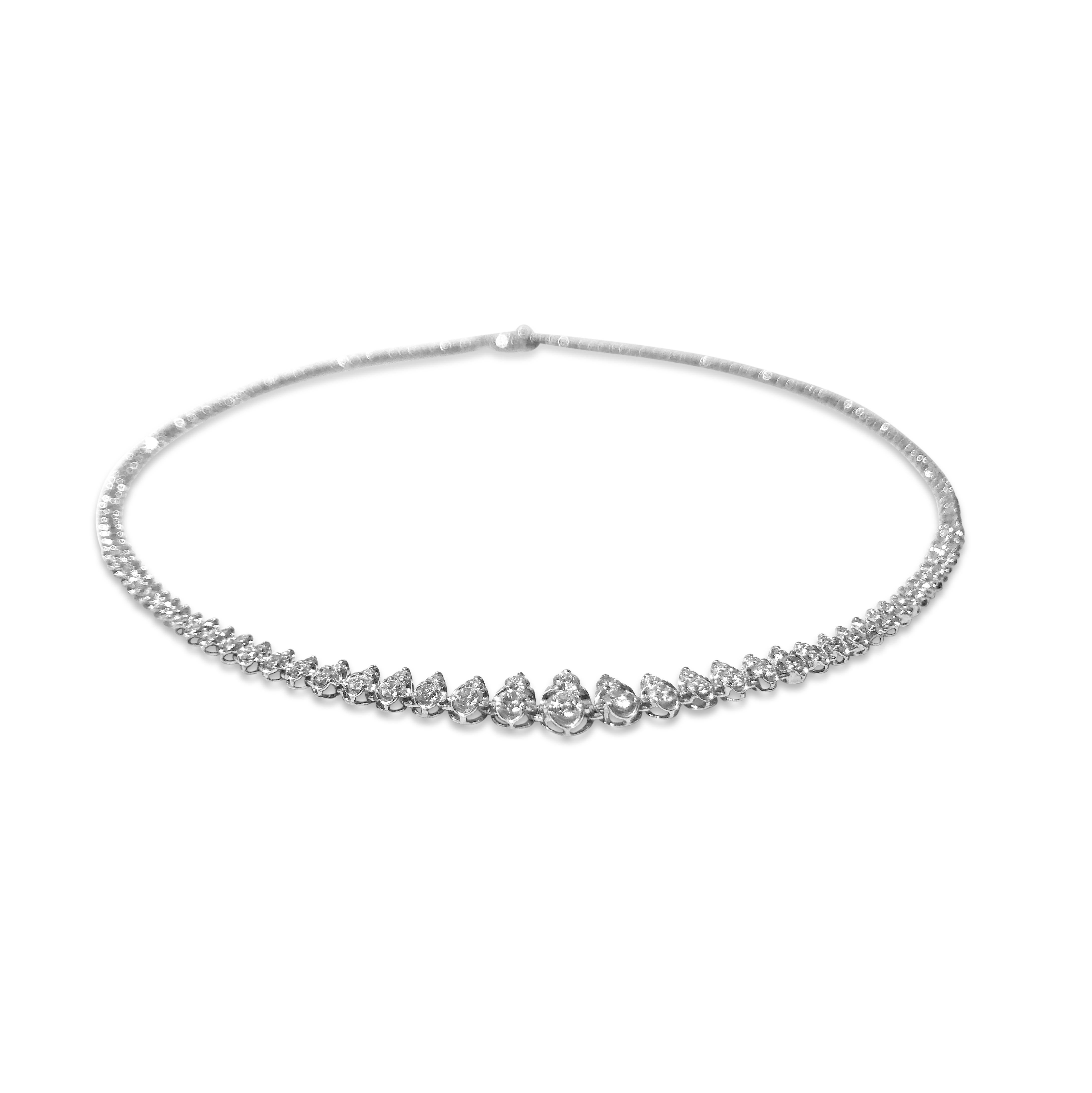 Our brilliant graduated diamond necklace is set in 14K white gold. 202 round white diamonds total 4.18ct, finished off with a secure closure.

Specifications:
- Stone(s): Diamonds
- Diamond-Cut & Clarity: 4.18ct. Round
- Dimension: 16