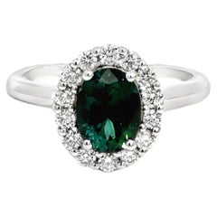 Anello aureola con granato verde in oro bianco 14k - 1,48 carati