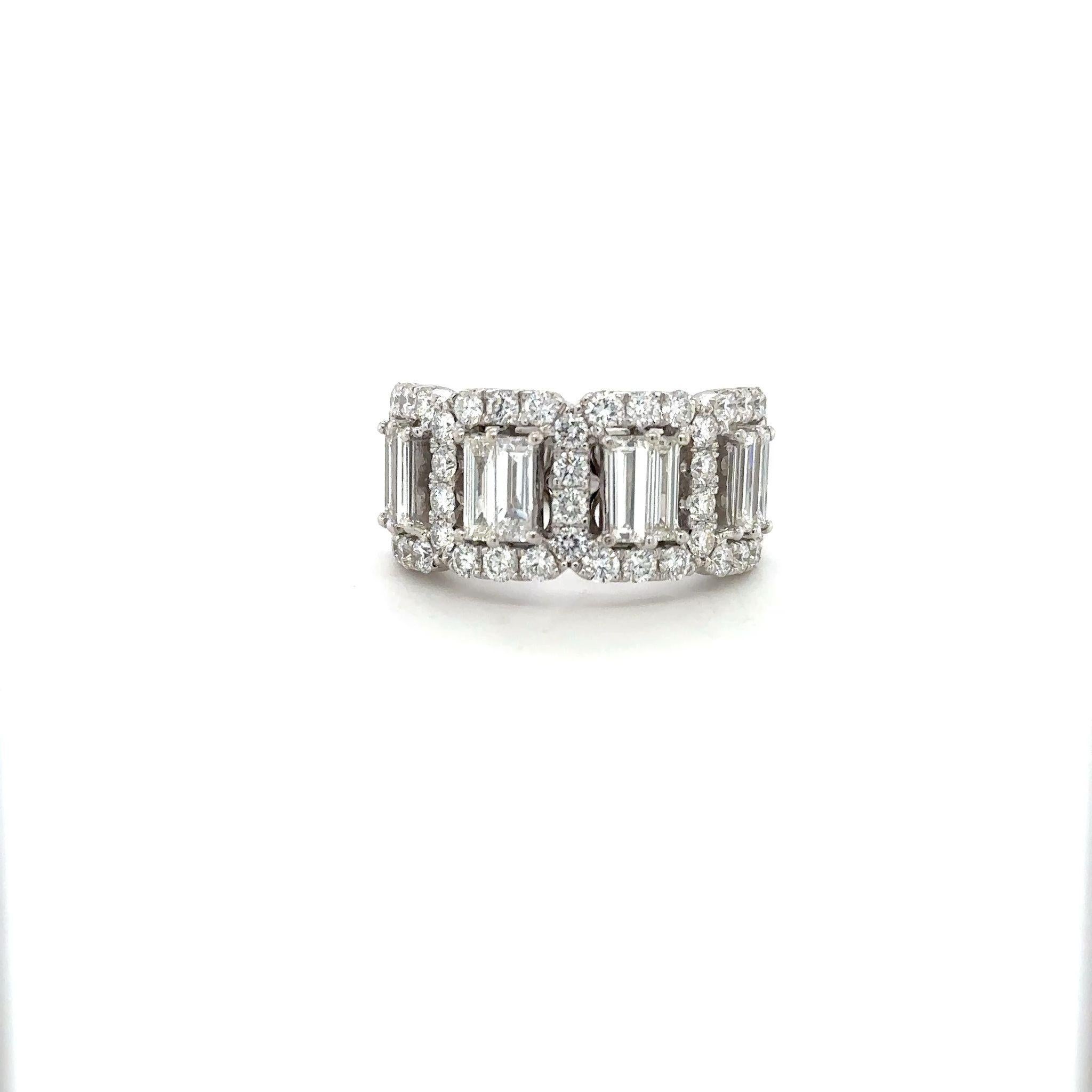 14 Karat White Gold Half Circle Diamond Ring – 2.86 Carats
Elevate your elegance with this stunning half circle diamond ring, crafted in lustrous 14 karat white gold. The ring features a striking row of baguette-cut diamonds, expertly set to create