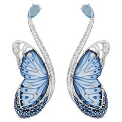 Orecchini in oro bianco 14K con incisione a mano a forma di farfalla con zaffiro blu e diamante
