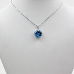 14k White Gold Heart Pendant with Blue Topaz and 16" Necklace.