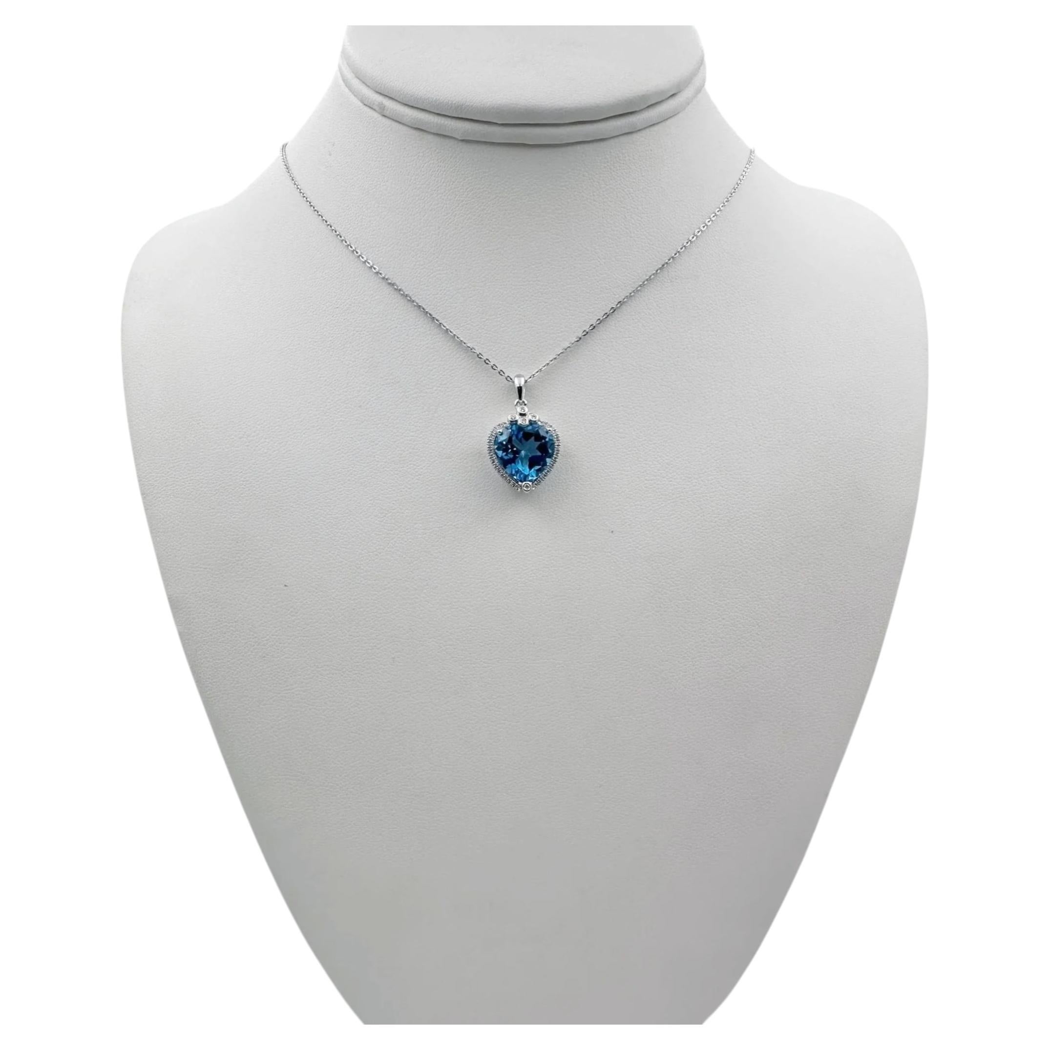 Ciondolo a cuore in oro bianco 14k con topazio blu e collana da 16 pollici.