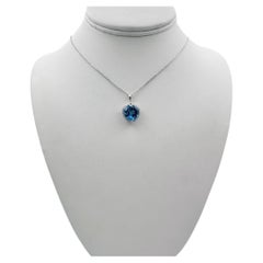 14k White Gold Heart Pendant with Blue Topaz and 16" Necklace.