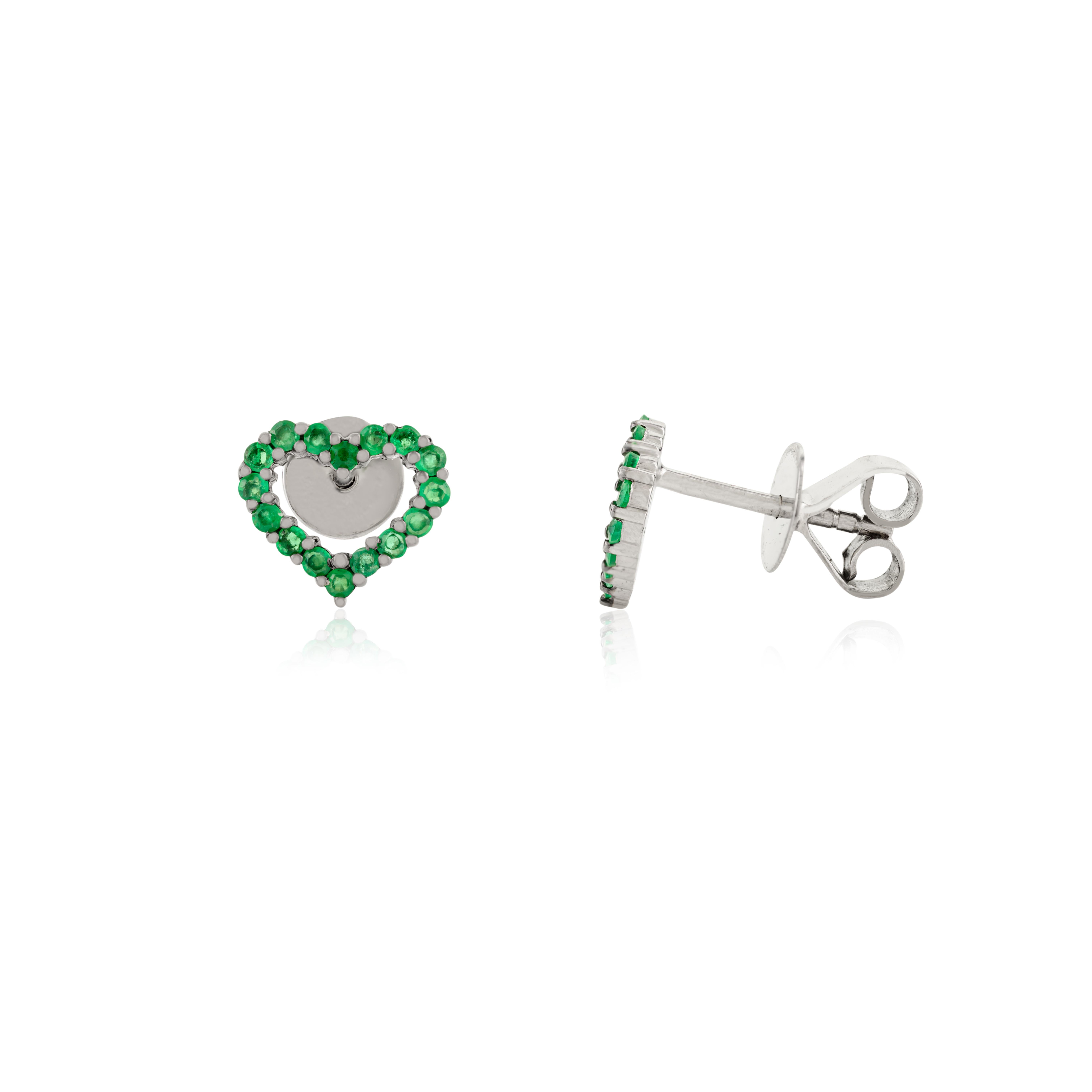 14k White Gold Heart Shaped Natural Emerald Stud Earrings. You shall need these stud earrings to make a statement with your look. These earrings create a sparkling, luxurious look featuring Round cut Natural Emerald.
Emerald promotes emotional