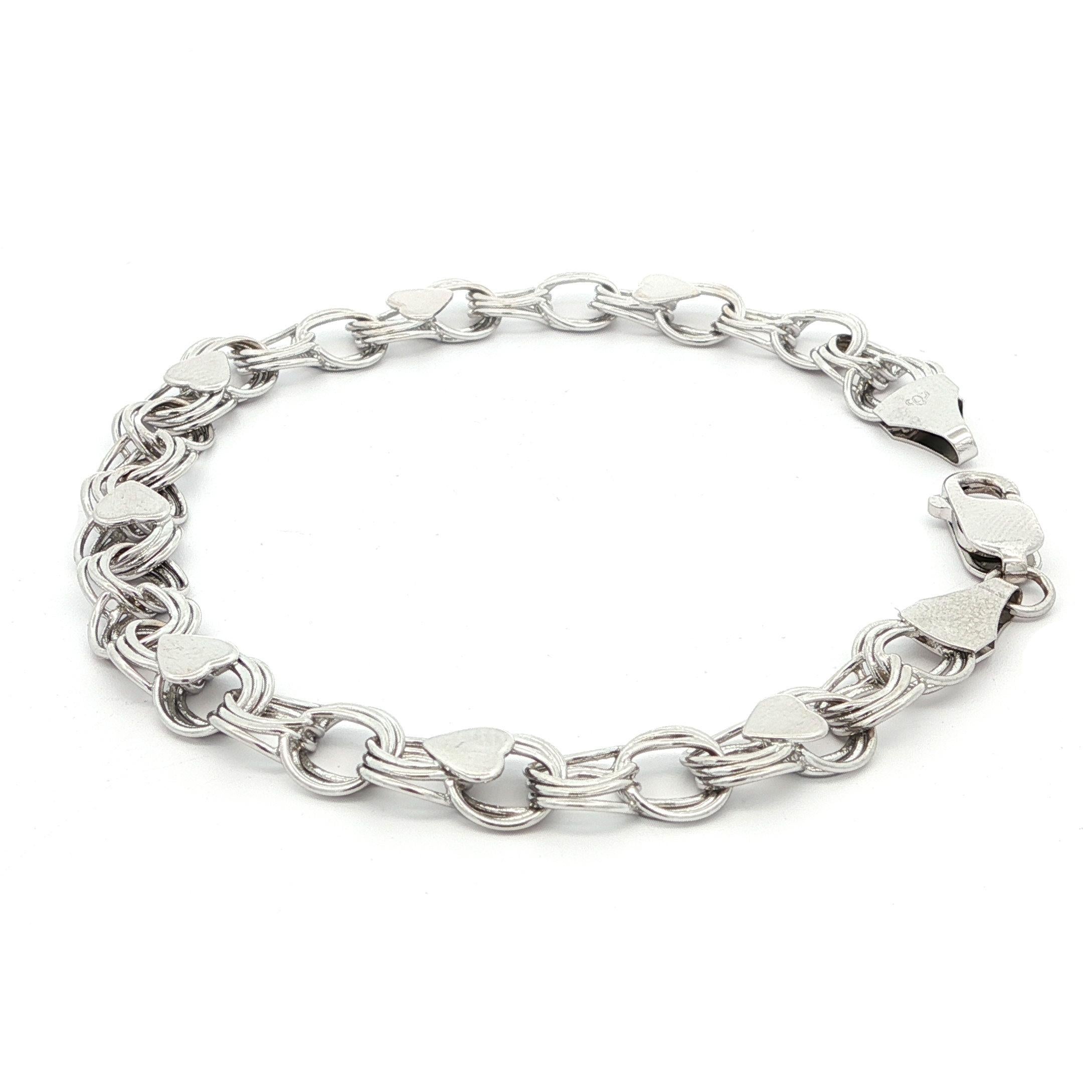 Pulsera de oro blanco de 14 quilates con eslabones circulares entrelazados y colgante estilo corazón en venta 1