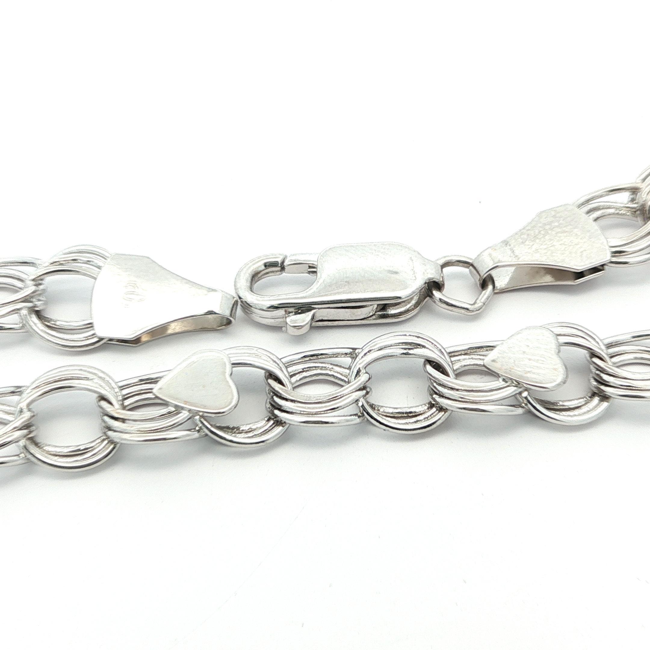Pulsera de oro blanco de 14 quilates con eslabones circulares entrelazados y colgante estilo corazón en venta 2