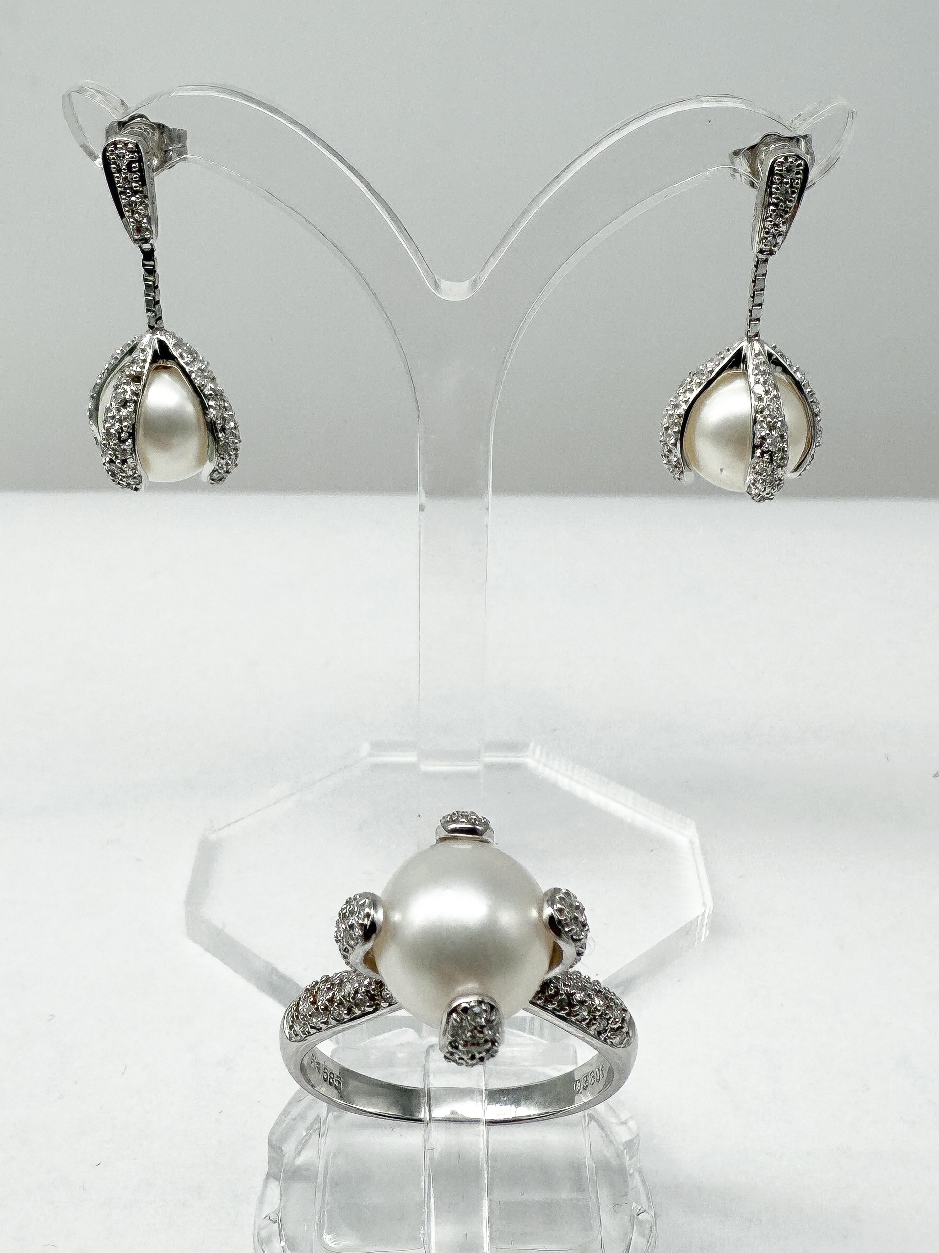 Timeless Elegance – 14K White Gold Jewelry Set with Natural Pearls and Diamonds

This exquisite jewelry set, consisting of a refined ring and matching earrings, blends classic elegance with timeless beauty. Crafted from premium 14-karat white gold,