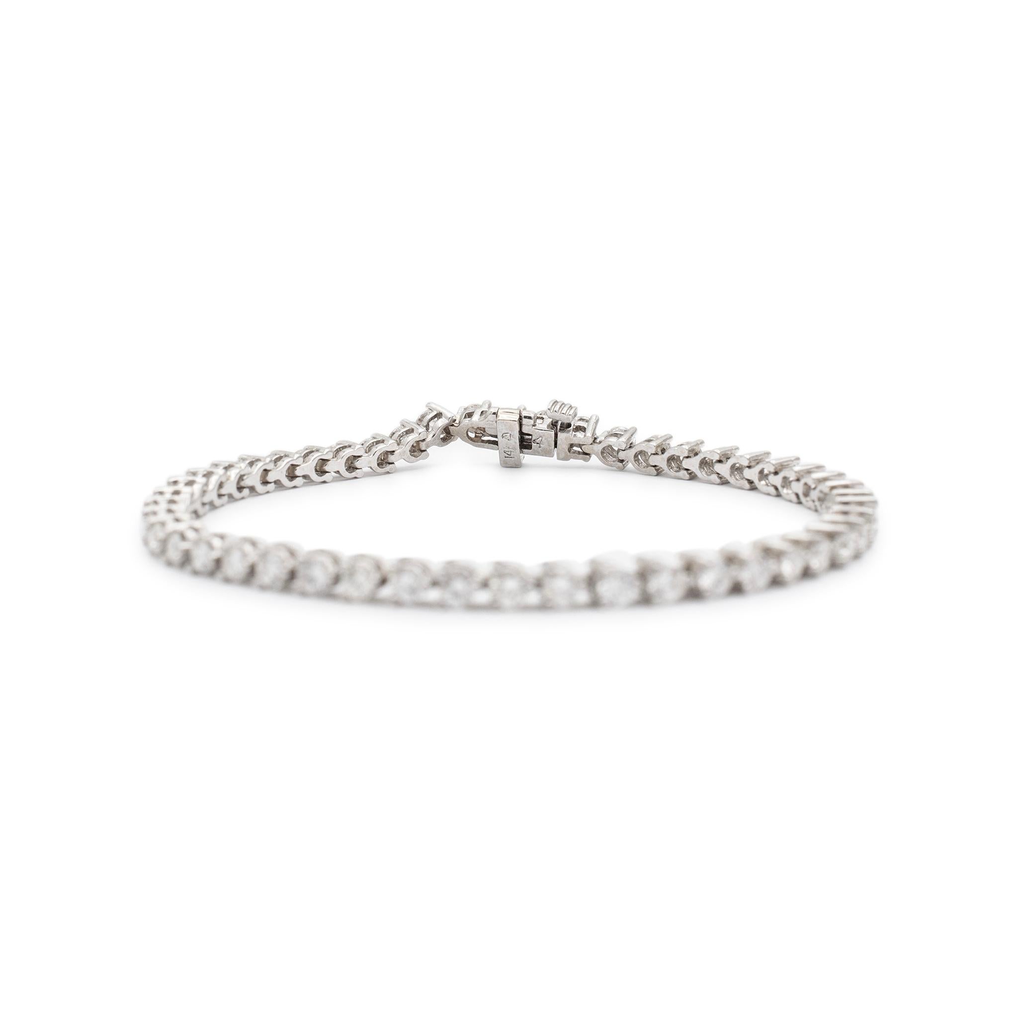 Round Cut 14K White Gold Ladies 3.90 Carats Diamond Tennis Bracelet For Sale