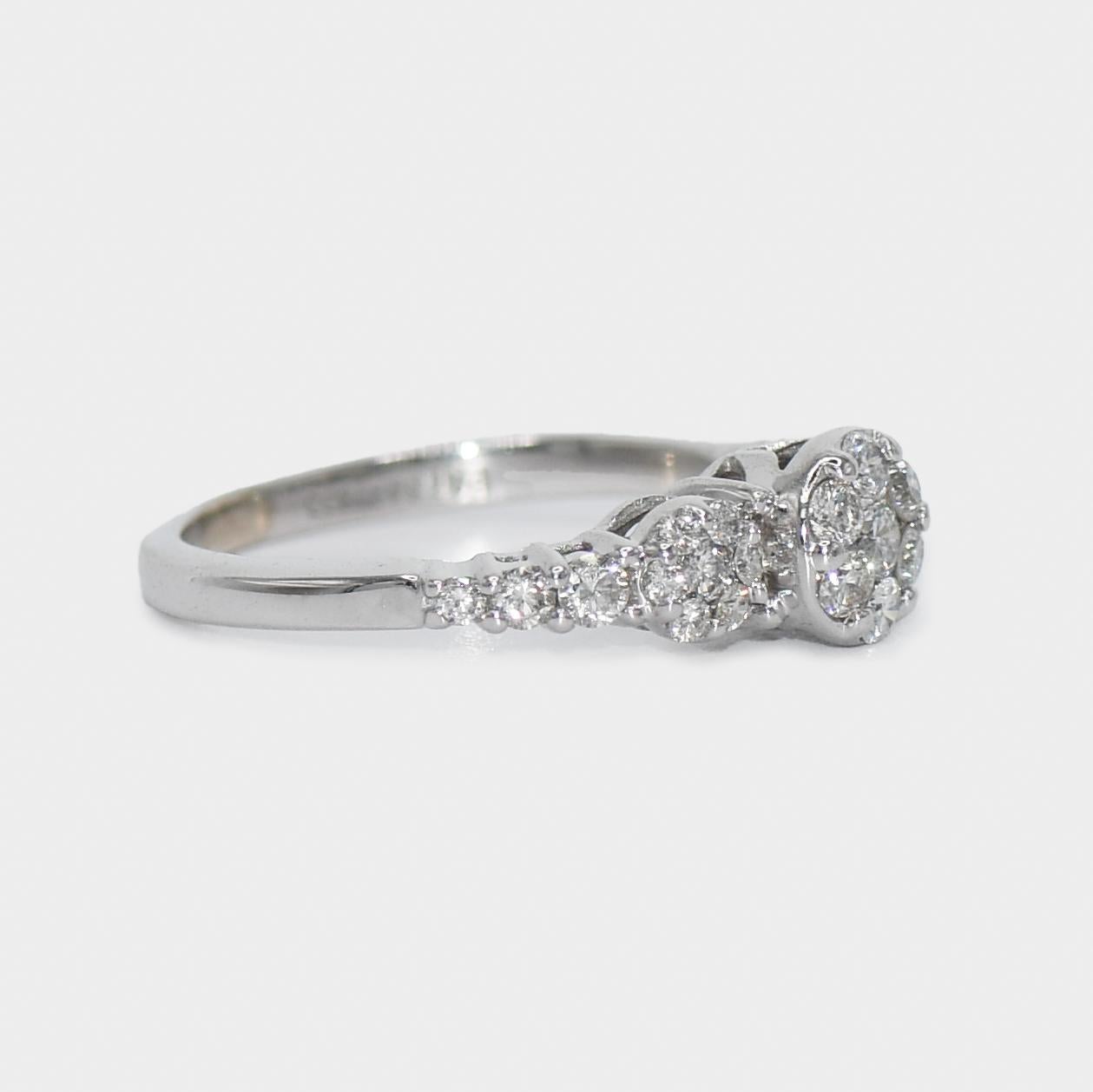 14K White Gold Ladies' Diamond Cluster Ring 0.40tdw, 2.6g
Ladies diamond cluster ring with 14k white gold setting.
Stamped 14k and weighs 2.6 grams.
The diamonds are round brilliant cuts, .40 total carats, H to i color, Si clarity, good cuts.
Ring