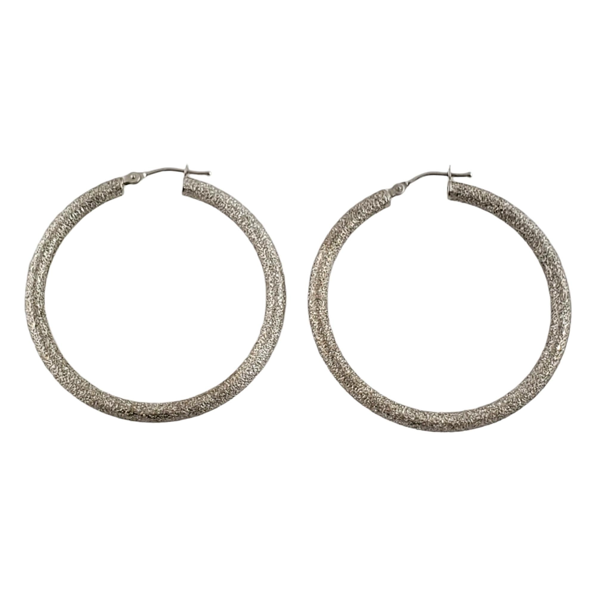 Vintage 14K White Gold Large Sparkle Hoop Earrings

This beautiful pair of 14K white gold hoops have a gorgeous sparkle to them!

Size: 40 mm X 40 mm X 3.5 mm

Weight: 3.1 gr/ 2.0 dwt

Hallmark: 14KT Italy

Very good condition, professionally