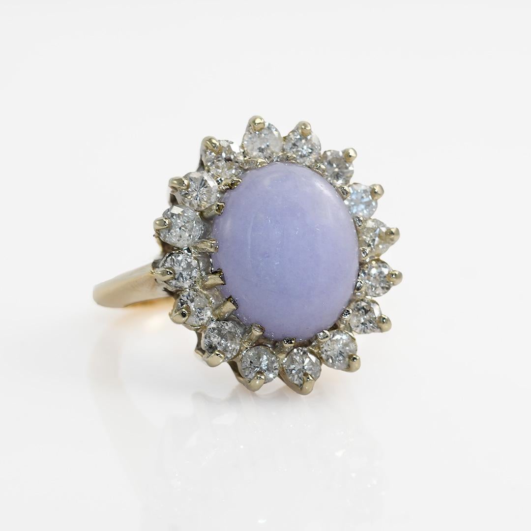 14K White Gold Lavendar Jade & Diamond Ring, 1.00tdw, 7.4g
Ladies lavendar jade and diamond ring.

The gold tests 56.5% gold with an XRF analyzer.

Gross ring weight is 7.4 grams.

The jade is an oval shape 12.8mm by 10.7mm, 6 carats, pale lavendar