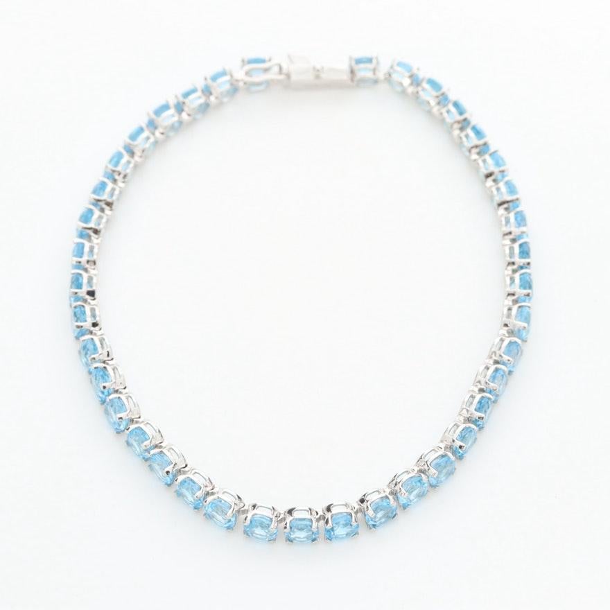 Round Cut 14 Karat White Gold Light Blue Topaz Tennis Line Bracelet