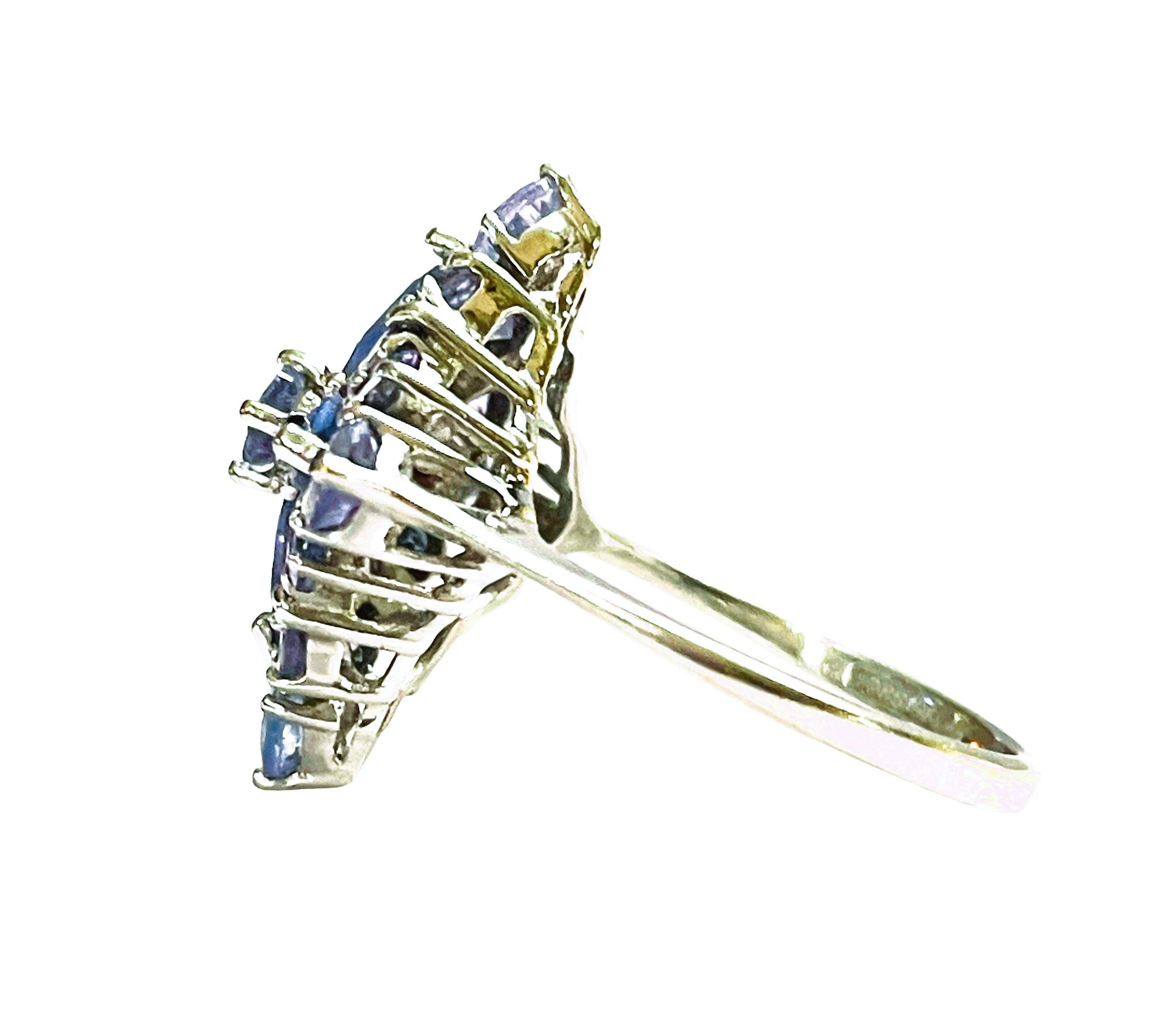 This is just a beautiful ring!   It is a pre-owned ring in excellent condition.  It is marked 