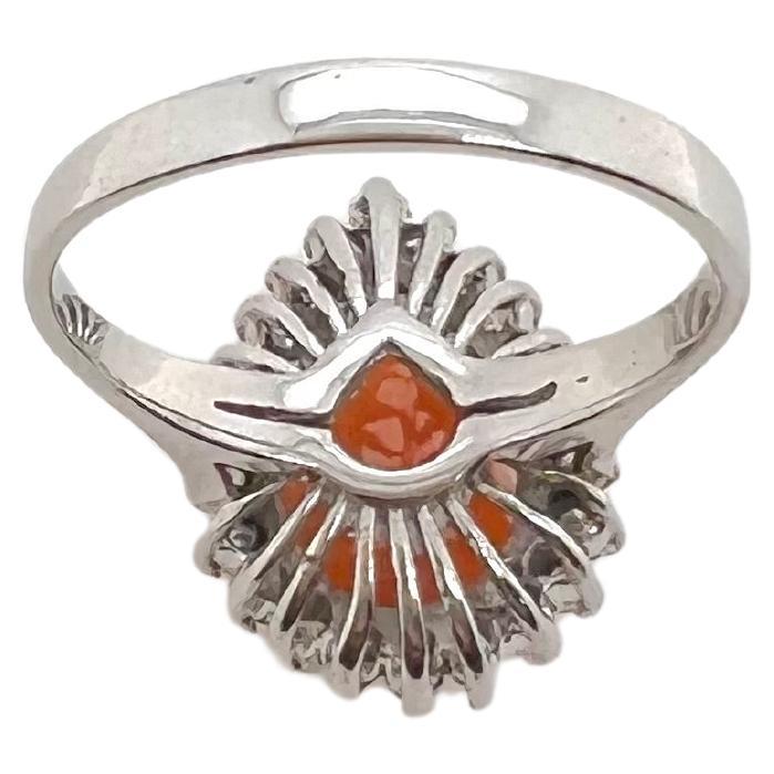 This stunning, pear shaped mandarin garnet is sent in a white gold setting with brilliant round diamonds around the stone.  The vibrant, pumpkin orange color will truly stand out and grasp everyone's attention!


Sized: 6.5 / can be sized 
Stond: